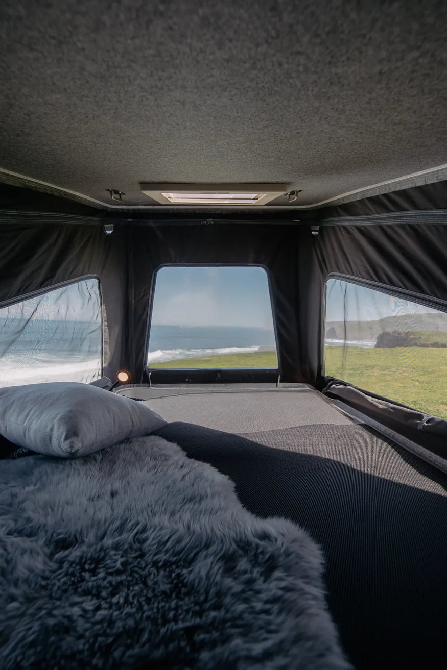 Couchage dans le toit relevable